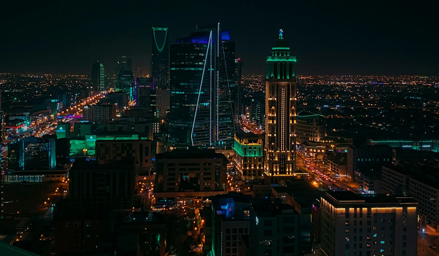 Riyadh skyline at night with the Kingdom Centre tower